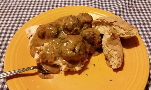 "Swedish" meatballs, mashed potatoes and gravy.