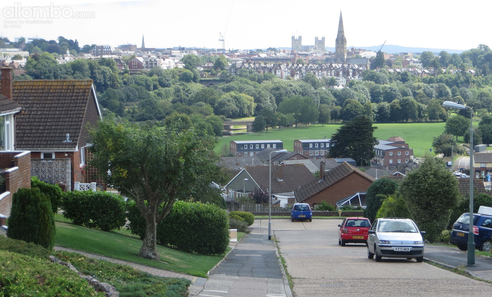 Exeter... the River Exe runs L to R thru the middle of the pic, where all the trees are. Exeter Cathedral is the thing that looks vaguely like a 2-tower castle.