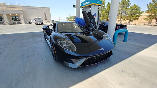 Ford GT at the gas station. Nice car.