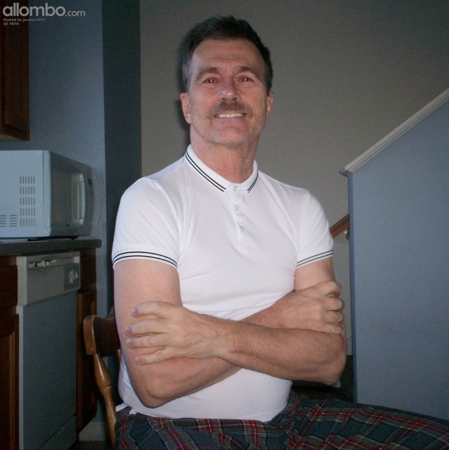 Portrait shot of me clad in a white polo shirt