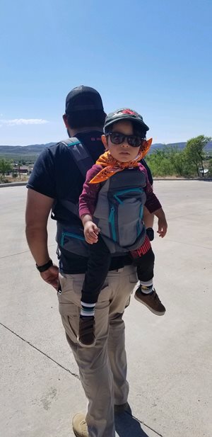 Son and grandson out for a walk