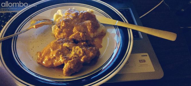Chicken thighs in Tikka Marsala, with mashed potato.