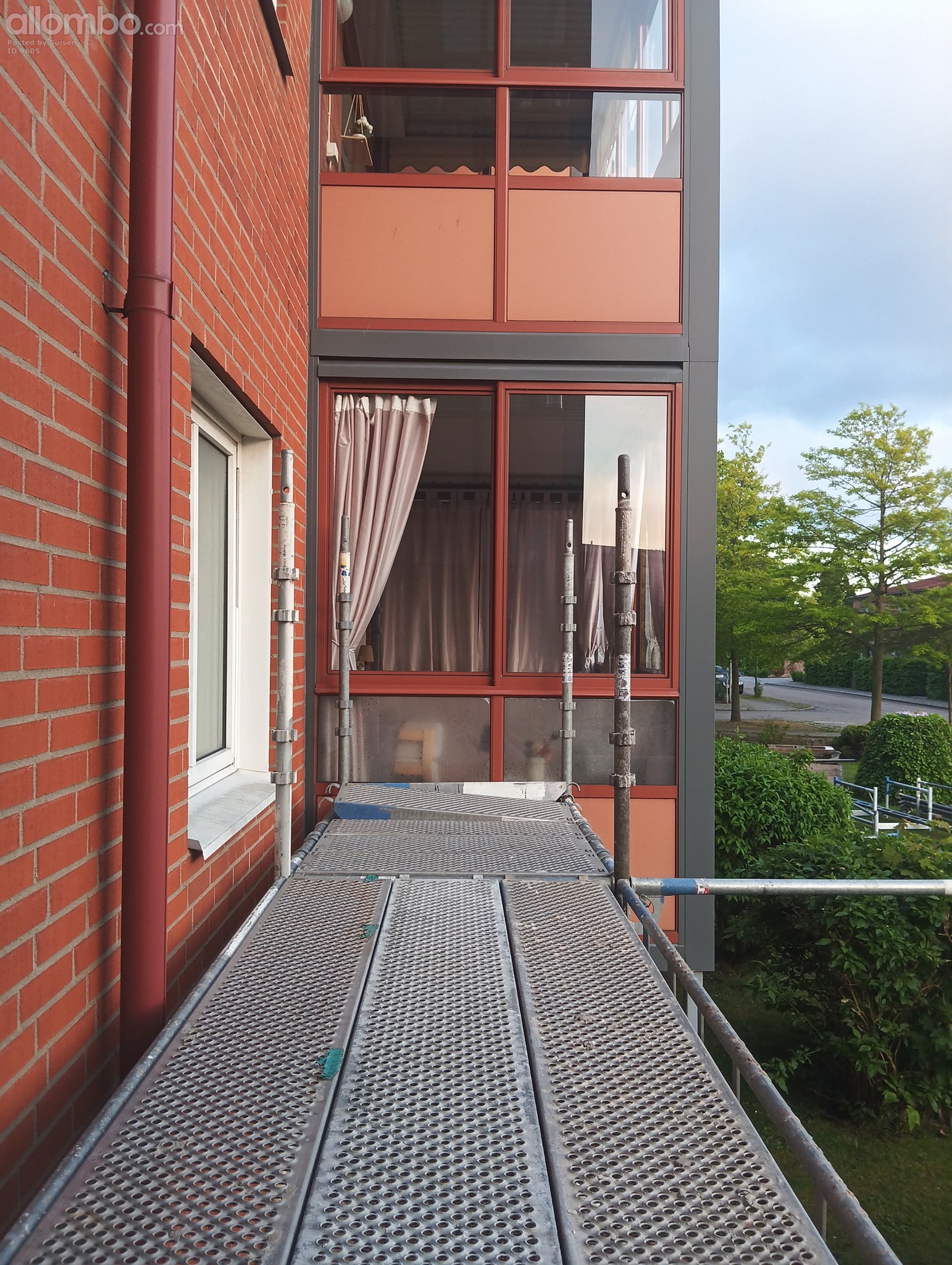 The guys setting up outside my kitchen