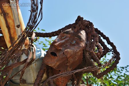 A very cool sculpture made out of recycled car parts...a Native American wa...