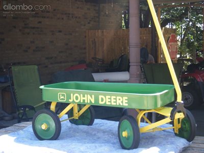 An old Road Master wagon converted to a John Deere Wagon for my lil Sis