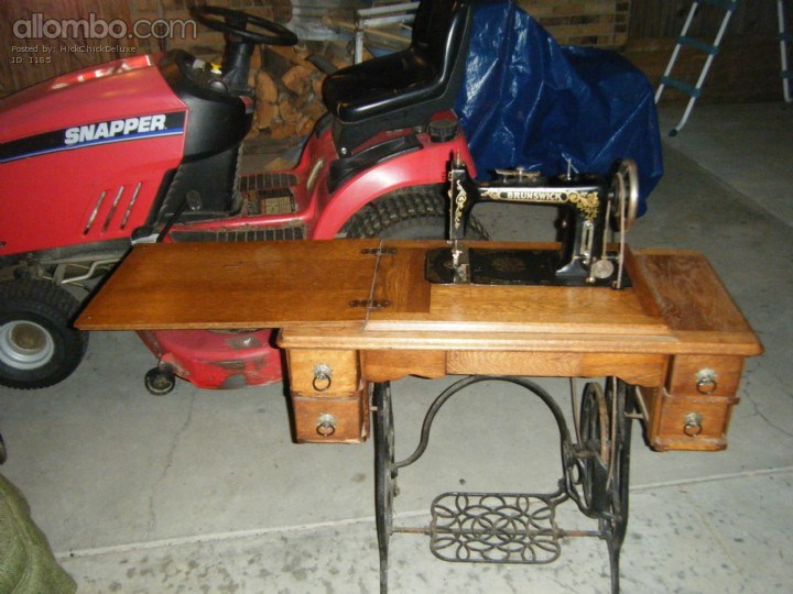 We bought this sewing Machine at a yard sale.  We may re-purpose it or restore it this winter we are not sure.