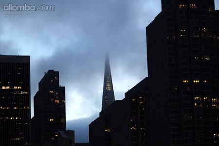 Buildings at sunset as the fog rolls in